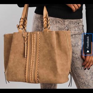 Brand new Buckle brand Violet Ray purse!